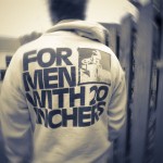 Hal Brindley wearing an original 2B "For Men With 20 Inchers" sweatshirt.