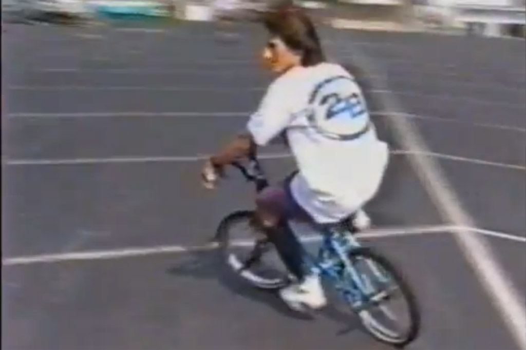 Mark Eaton sporting the 2B Brotherhood tee in the video Baking With Leigh 1991