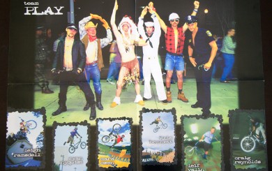 PLAY poster featuring the team dressed as the Village People, 1998