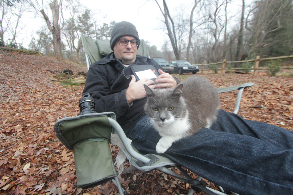 Scamper sitting on Leigh's lap in my backyard, Jan 2013
