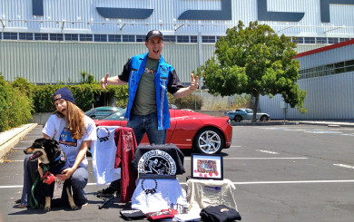 John Rokos posing with Jana & Arturo in front of the Tesla factory where he works with his 